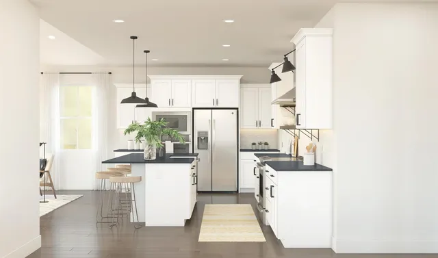 a living room with kitchen island furniture and a chandelier