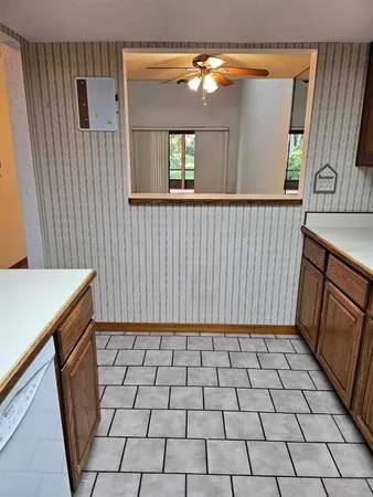 a view of a brick house with a window