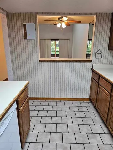 a view of a brick house with a window