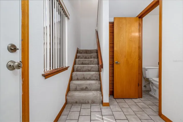 a view of an entryway with staircase