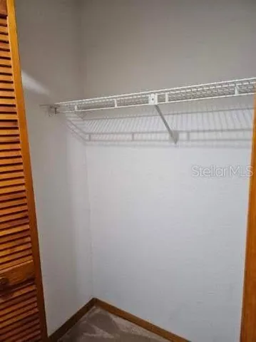a view of a room with racks on the wall