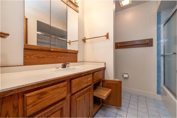 a bathroom with a sink and a toilet