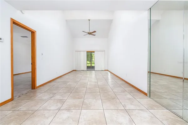 wooden floor in a hall with a window
