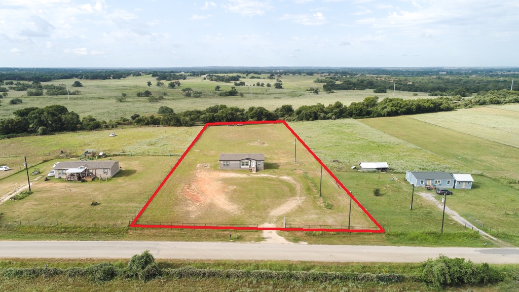 859 Ivy Switch Road Luling, TX 78648 - Photo 1 of 29 Overview of rural landscape with property boundaries highlighted