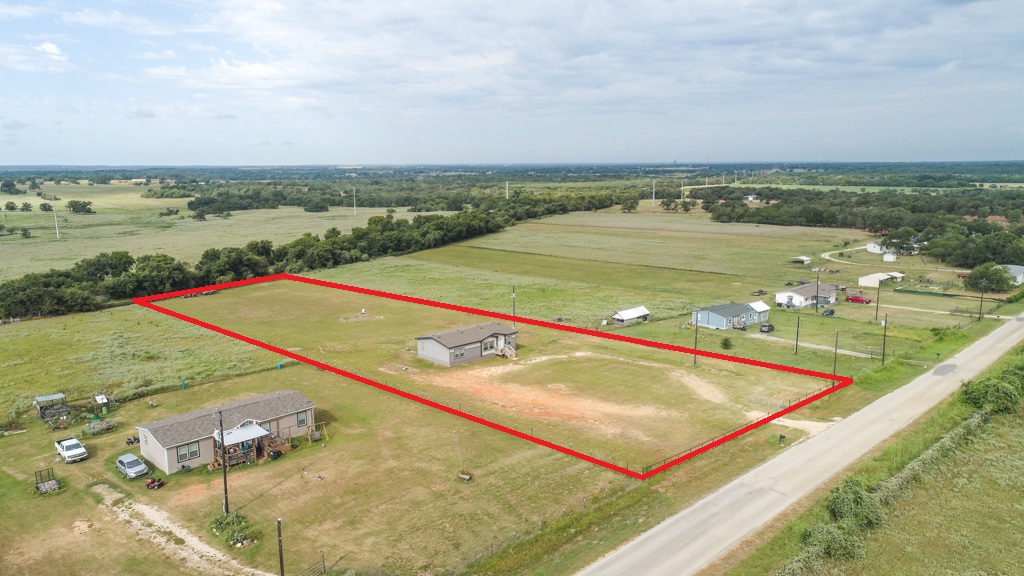 859 Ivy Switch Road Luling, TX 78648 - Photo 7 of 29 Overview of rural landscape featuring property parcel outlined