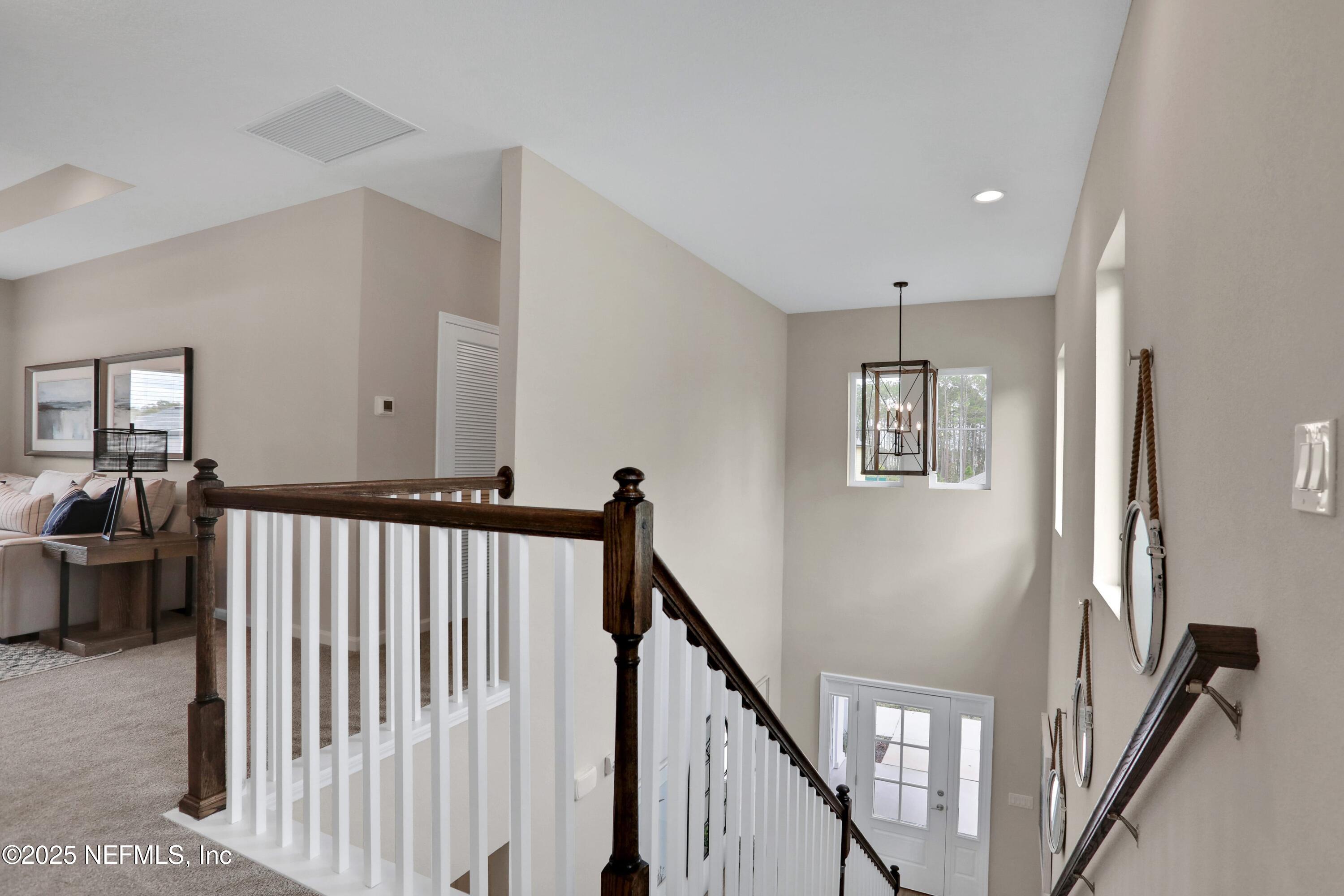494 Archstone Way St. Augustine, FL 32092 - Photo 61 of 67 a view of a hallway with workspace