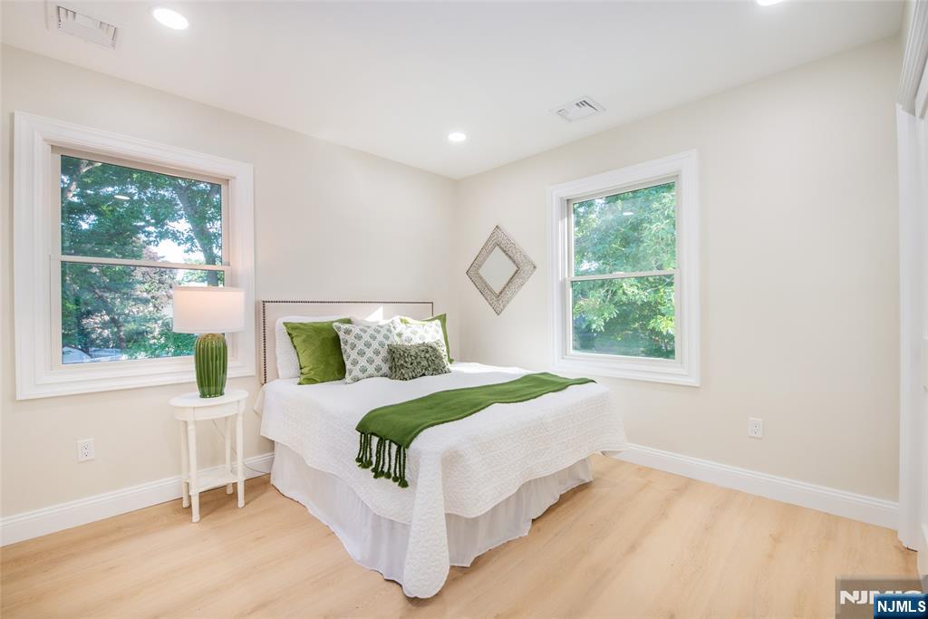 145 Grove Street Mahwah, NJ 07430 - Photo 19 of 30 a bedroom with a bed and a window