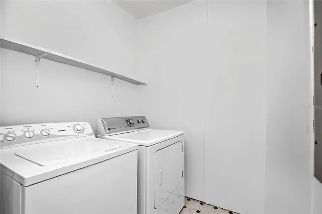 a balcony view with a backyard space