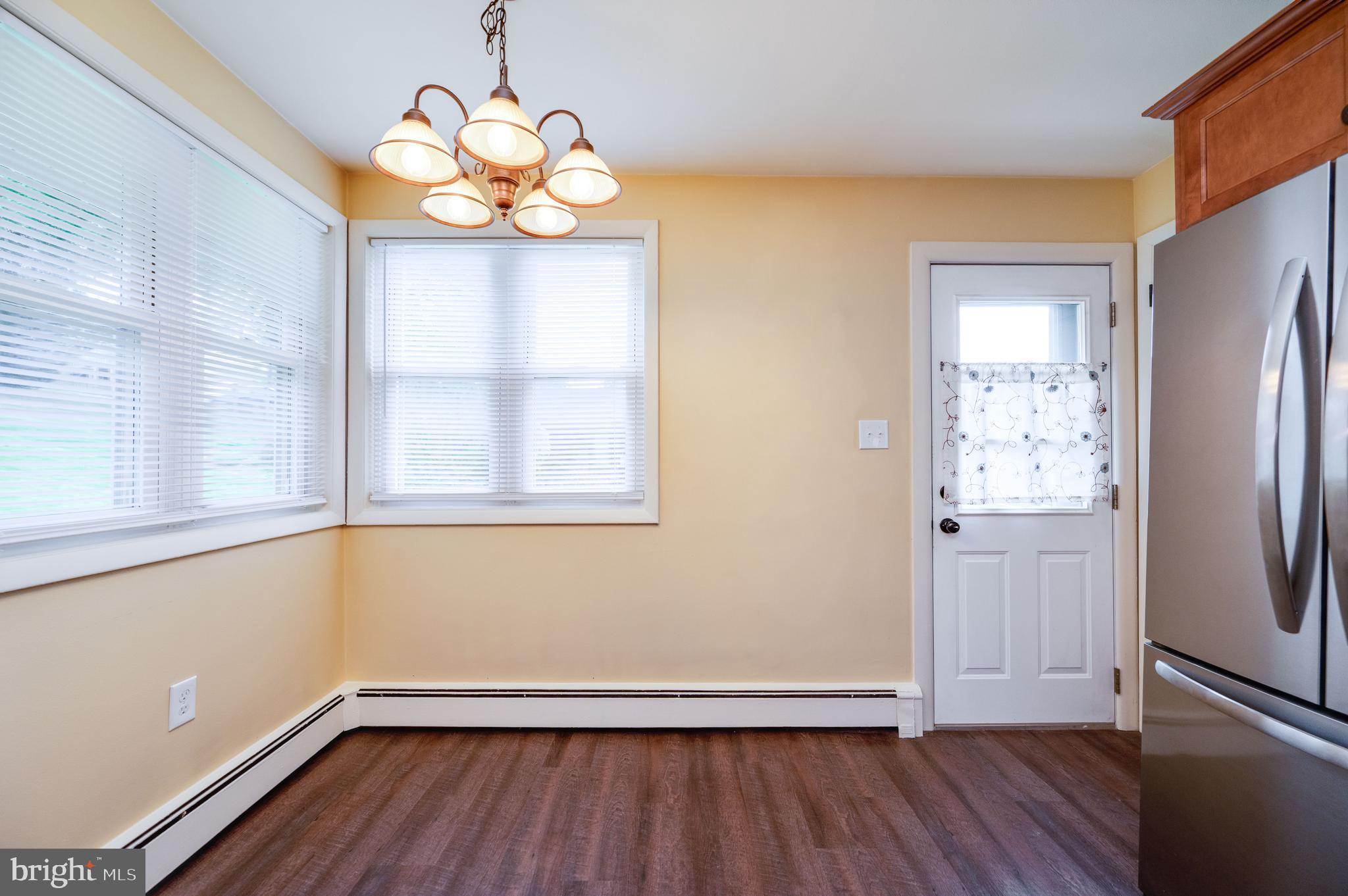 1392 New Holland Road Reading, PA 19607 - Photo 16 of 27 a view of wooden floor and windows in a room