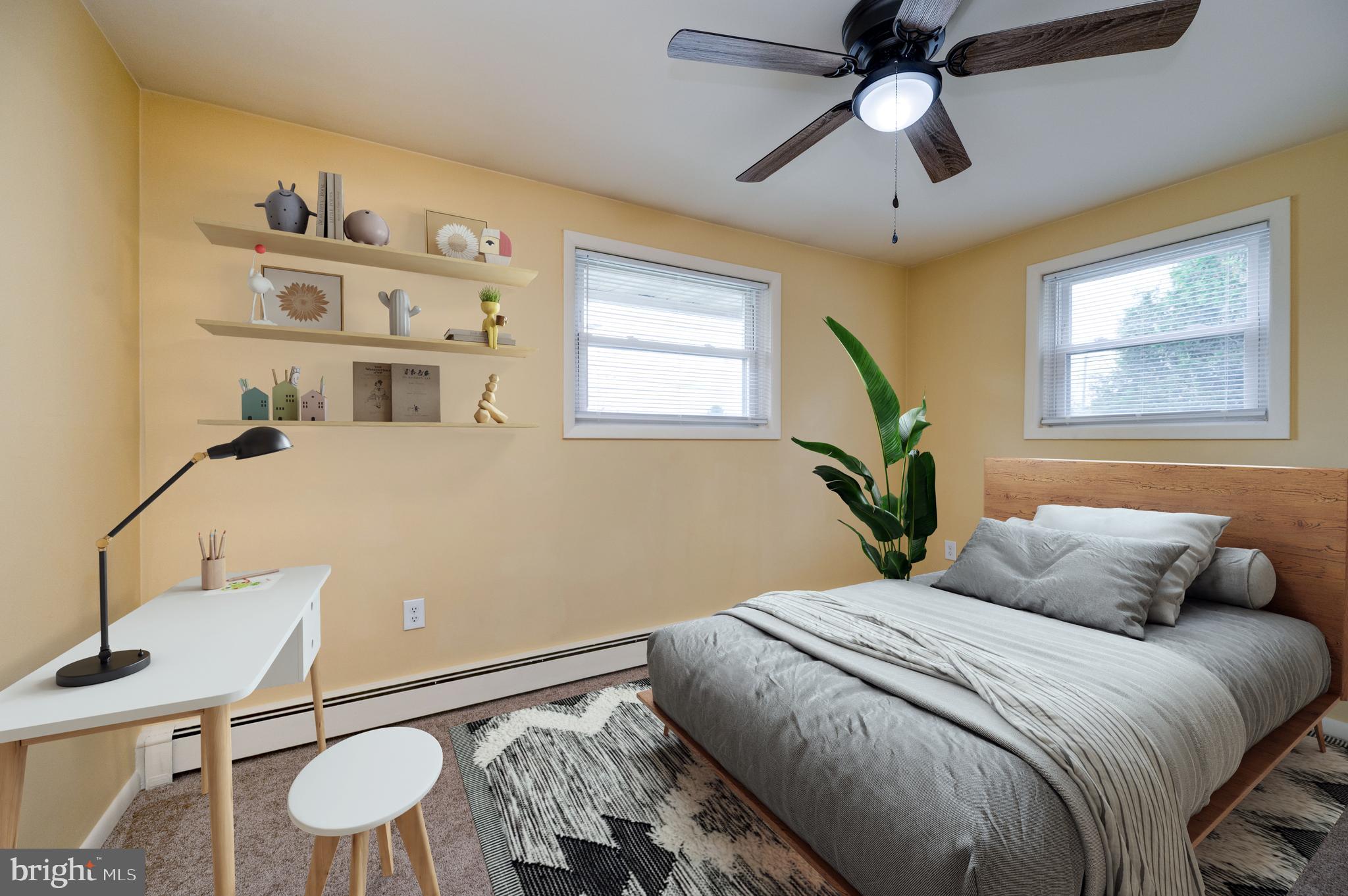 1392 New Holland Road Reading, PA 19607 - Photo 5 of 27 a bedroom with a bed and a chandelier