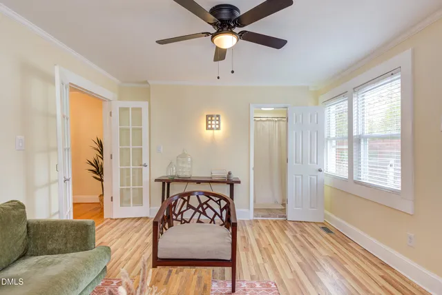 a en suite bathroom with a sink a toilet and a mirror