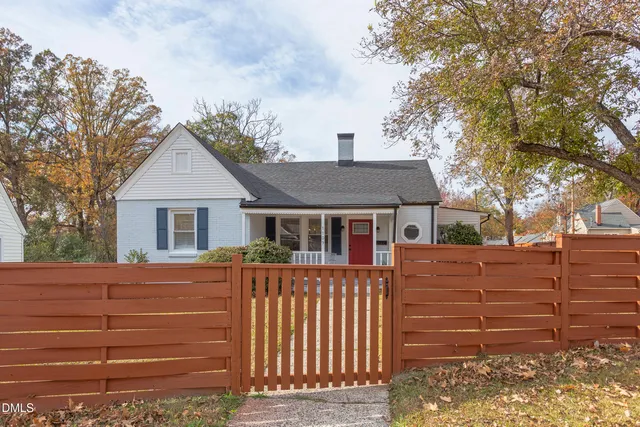 a spacious bedroom with a bed and a couch