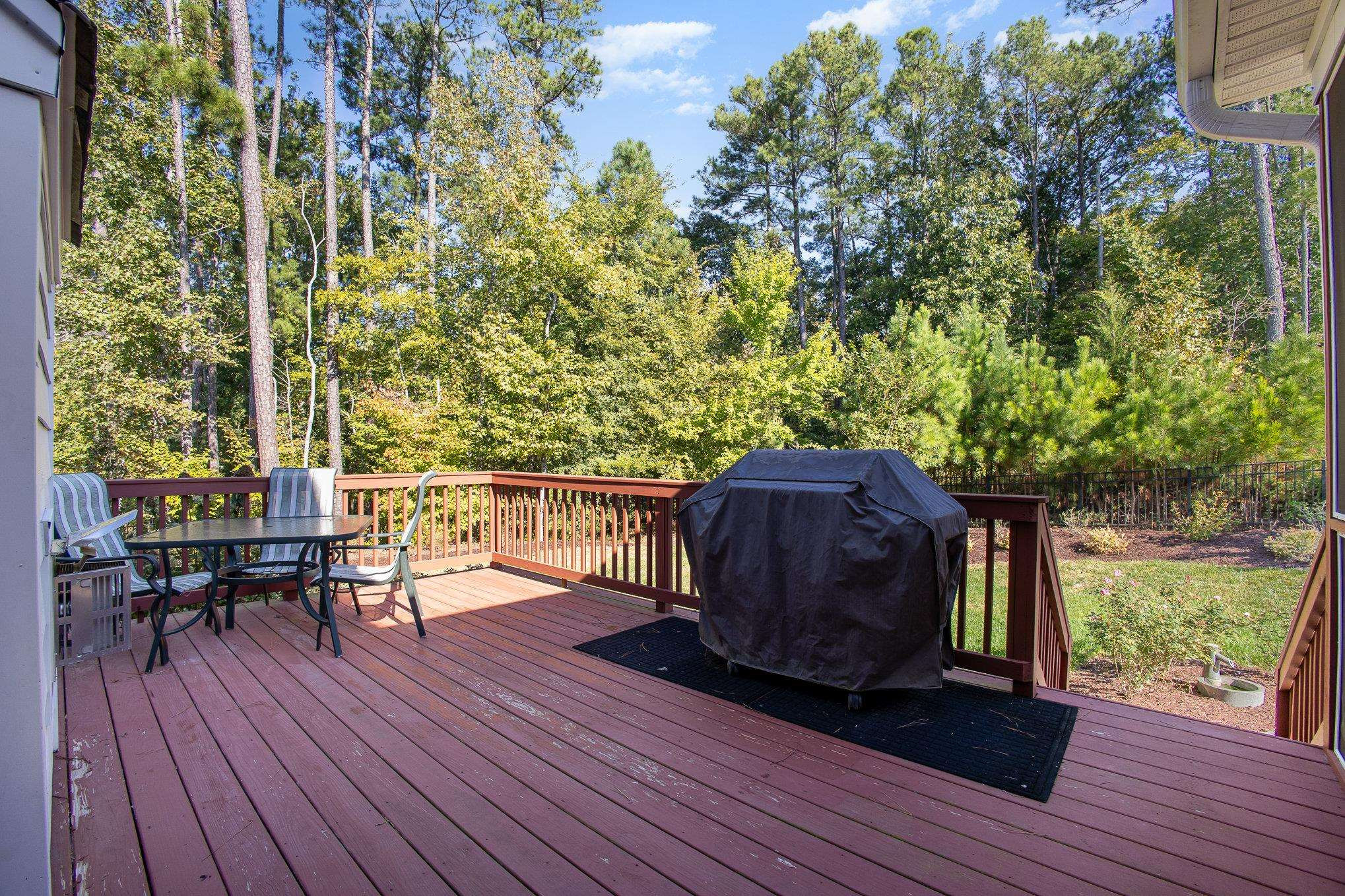 610 Swift Creek Crossing Durham, NC 27713 - Photo 3 of 48 a view of balcony with wooden floor and outdoor seating