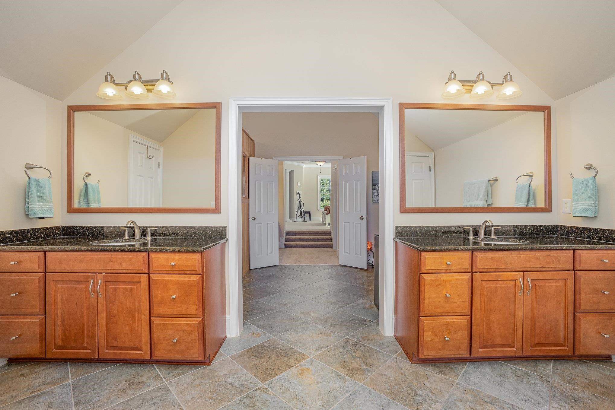 610 Swift Creek Crossing Durham, NC 27713 - Photo 31 of 48 a bathroom with a sink vanity and mirror