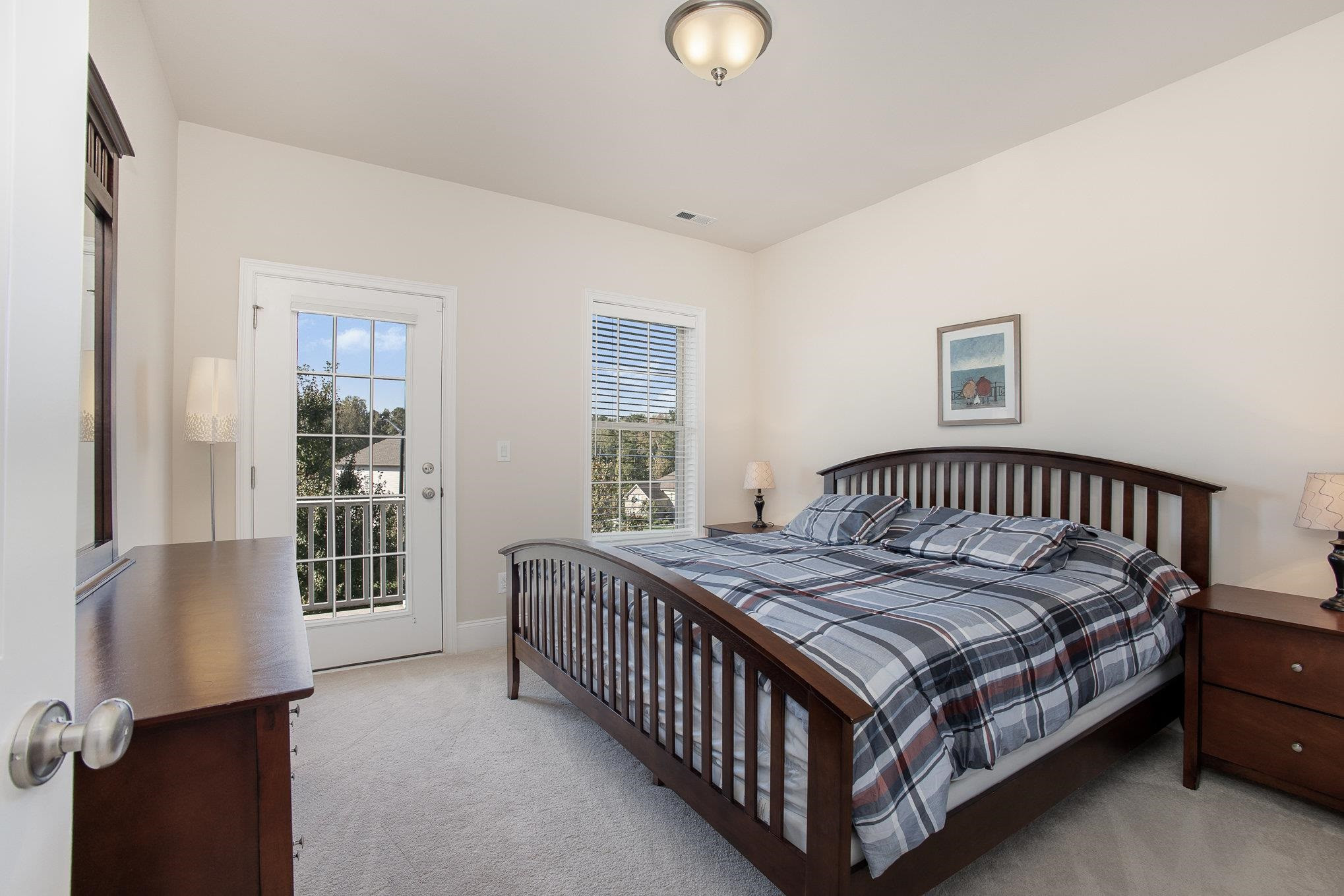610 Swift Creek Crossing Durham, NC 27713 - Photo 35 of 48 a bedroom with a bed and a window