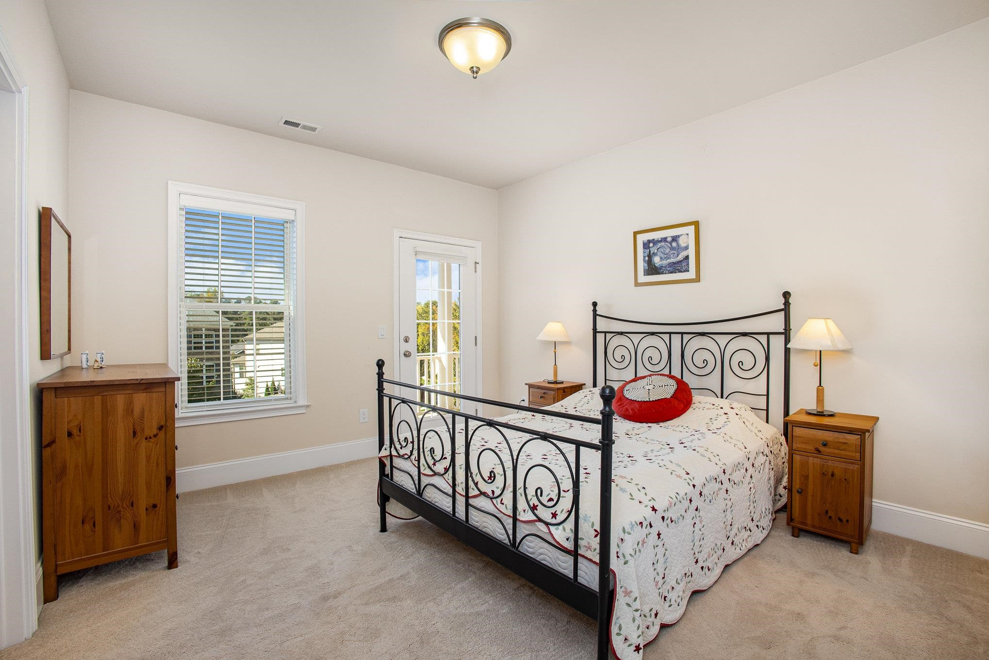 610 Swift Creek Crossing Durham, NC 27713 - Photo 37 of 48 a view of a bedroom with window and a couch