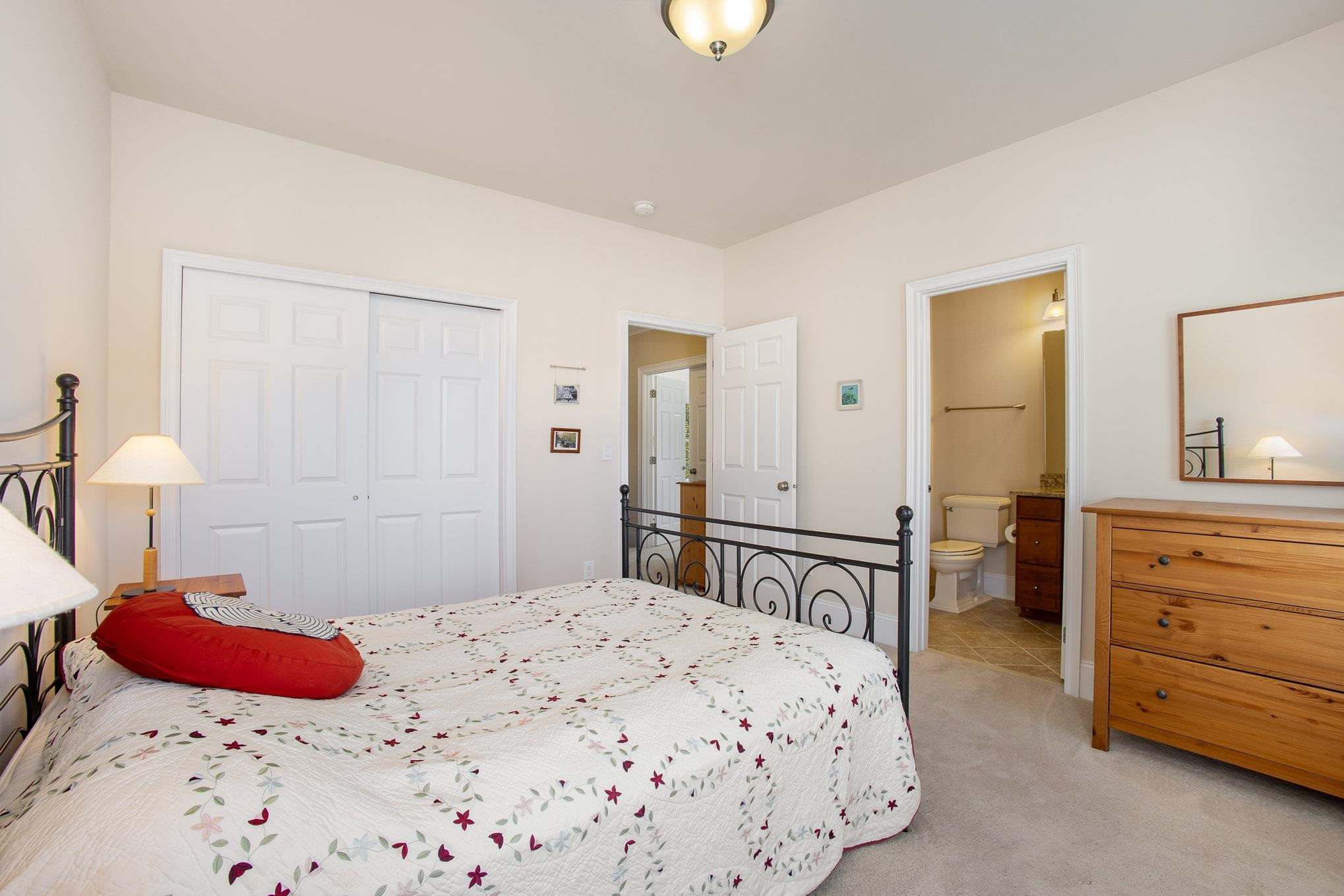 610 Swift Creek Crossing Durham, NC 27713 - Photo 38 of 48 a bedroom with a bed and dresser