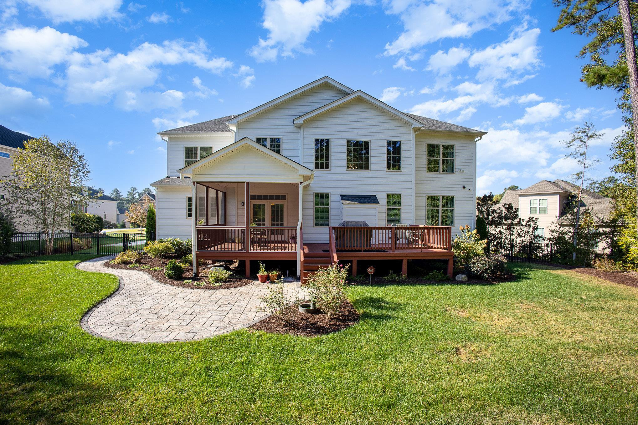 610 Swift Creek Crossing Durham, NC 27713 - Photo 42 of 48 a front view of a house with yard and green space