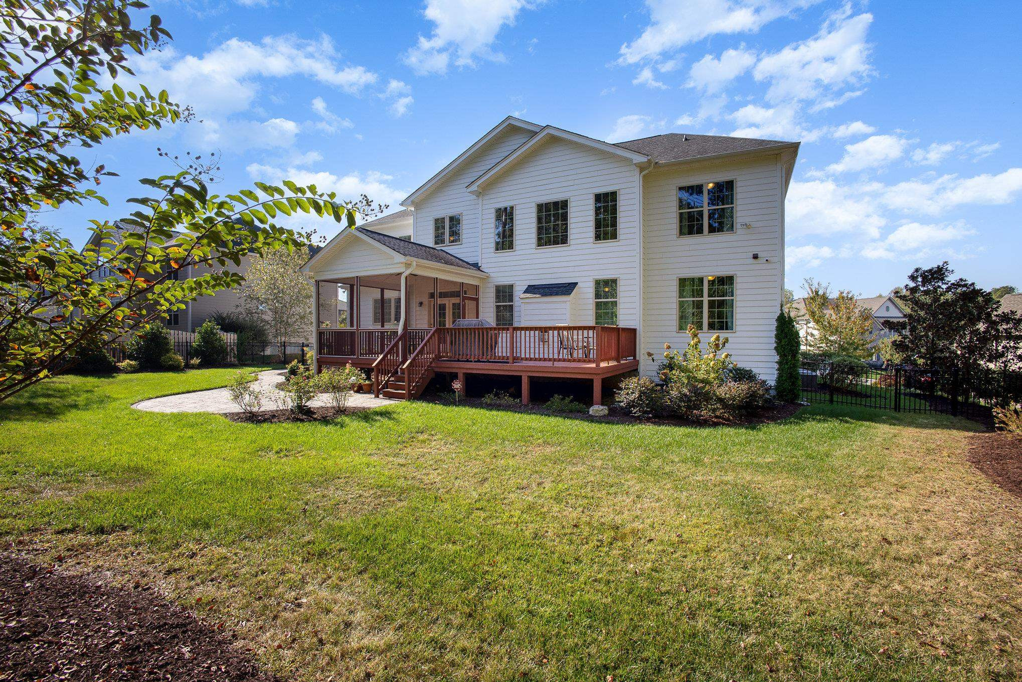 610 Swift Creek Crossing Durham, NC 27713 - Photo 43 of 48 a front view of a house with garden and porch