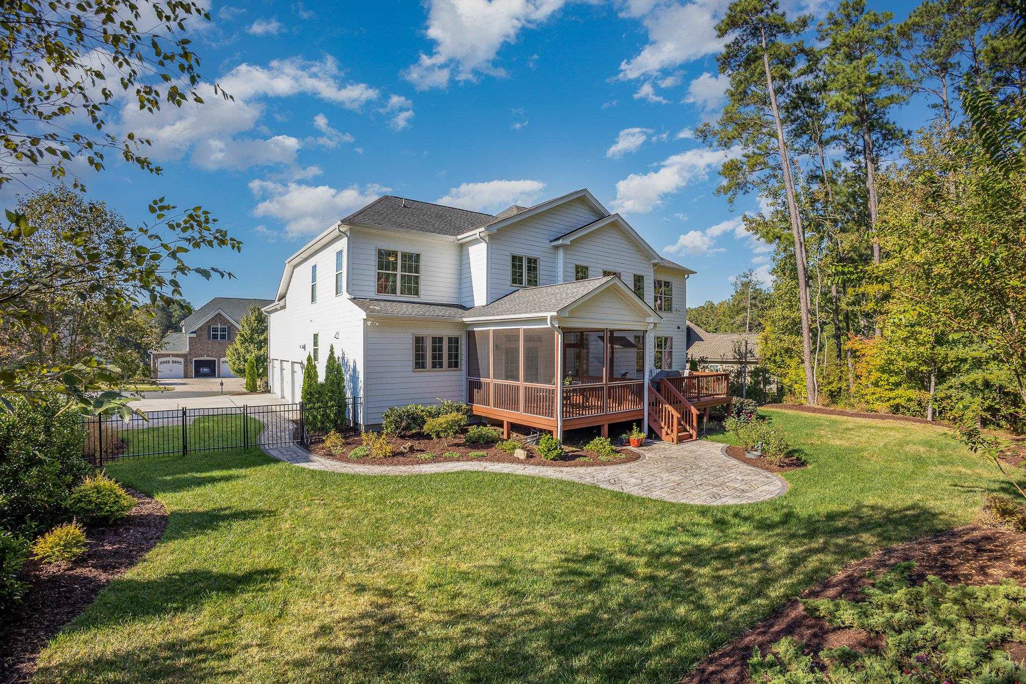 610 Swift Creek Crossing Durham, NC 27713 - Photo 44 of 48 a view of a house with garden and trees