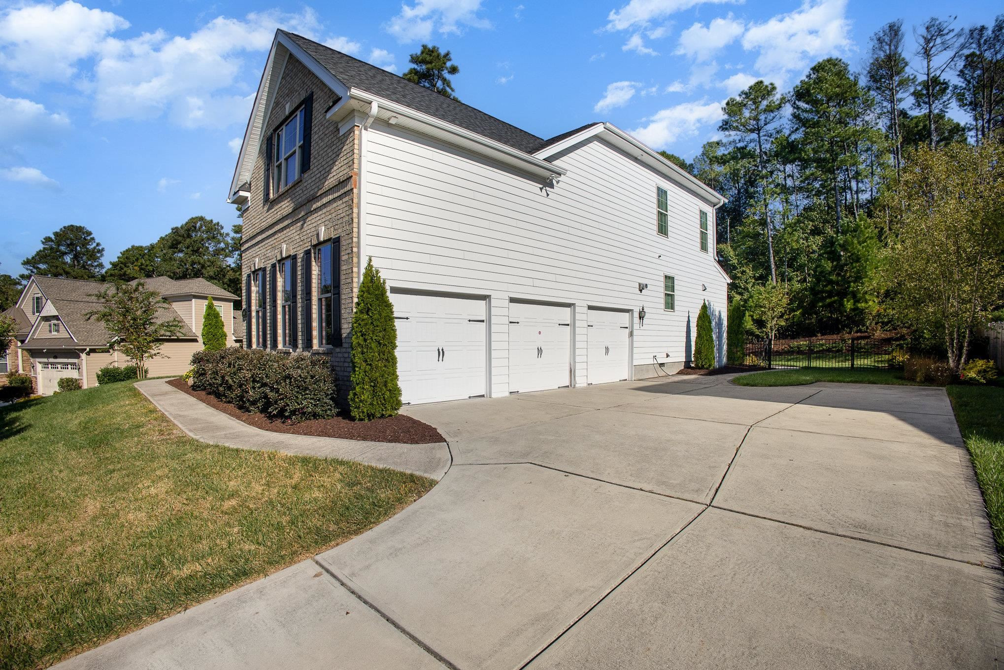 610 Swift Creek Crossing Durham, NC 27713 - Photo 45 of 48 a view of a house with a backyard