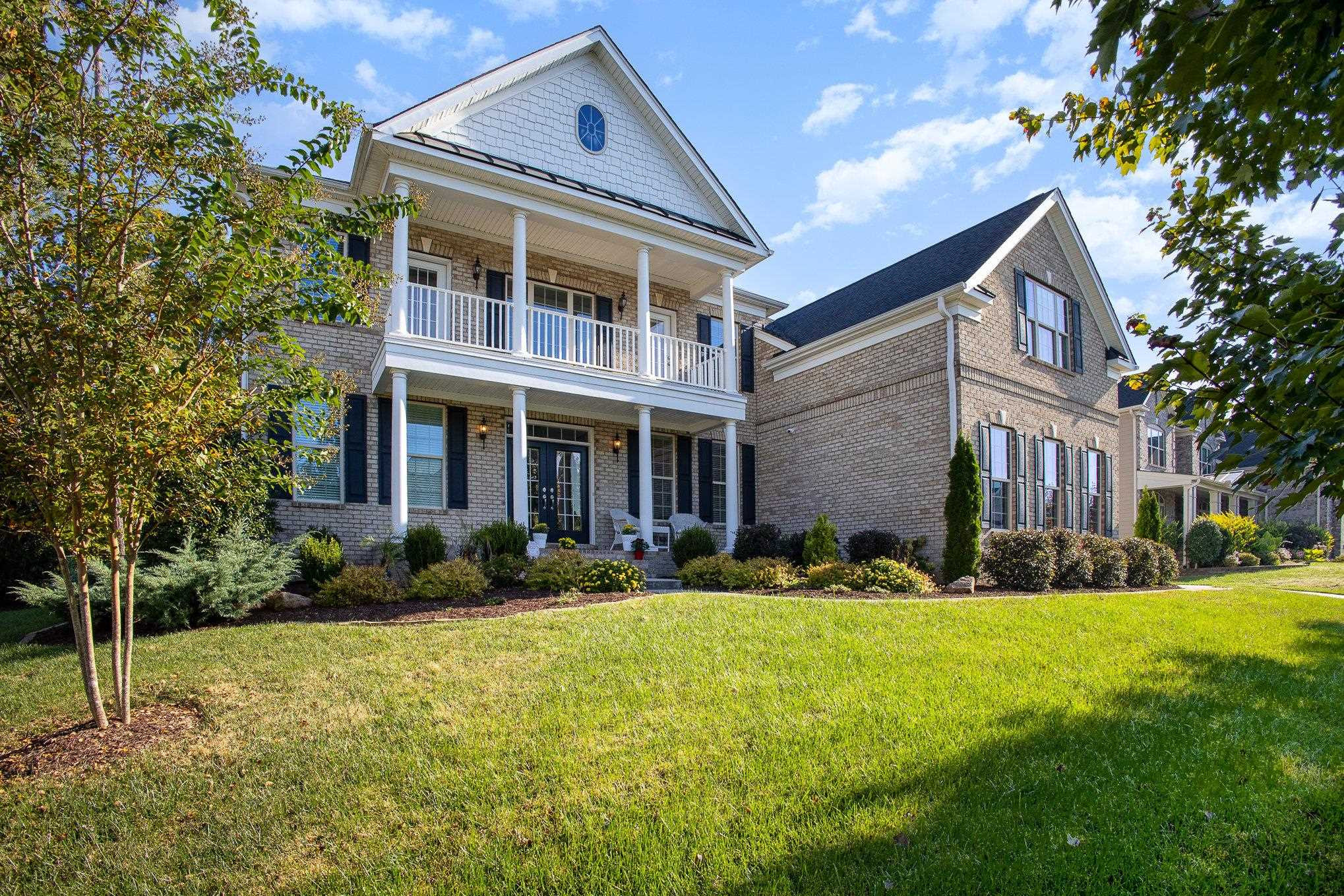 610 Swift Creek Crossing Durham, NC 27713 - Photo 7 of 48 a front view of building with yard and green space