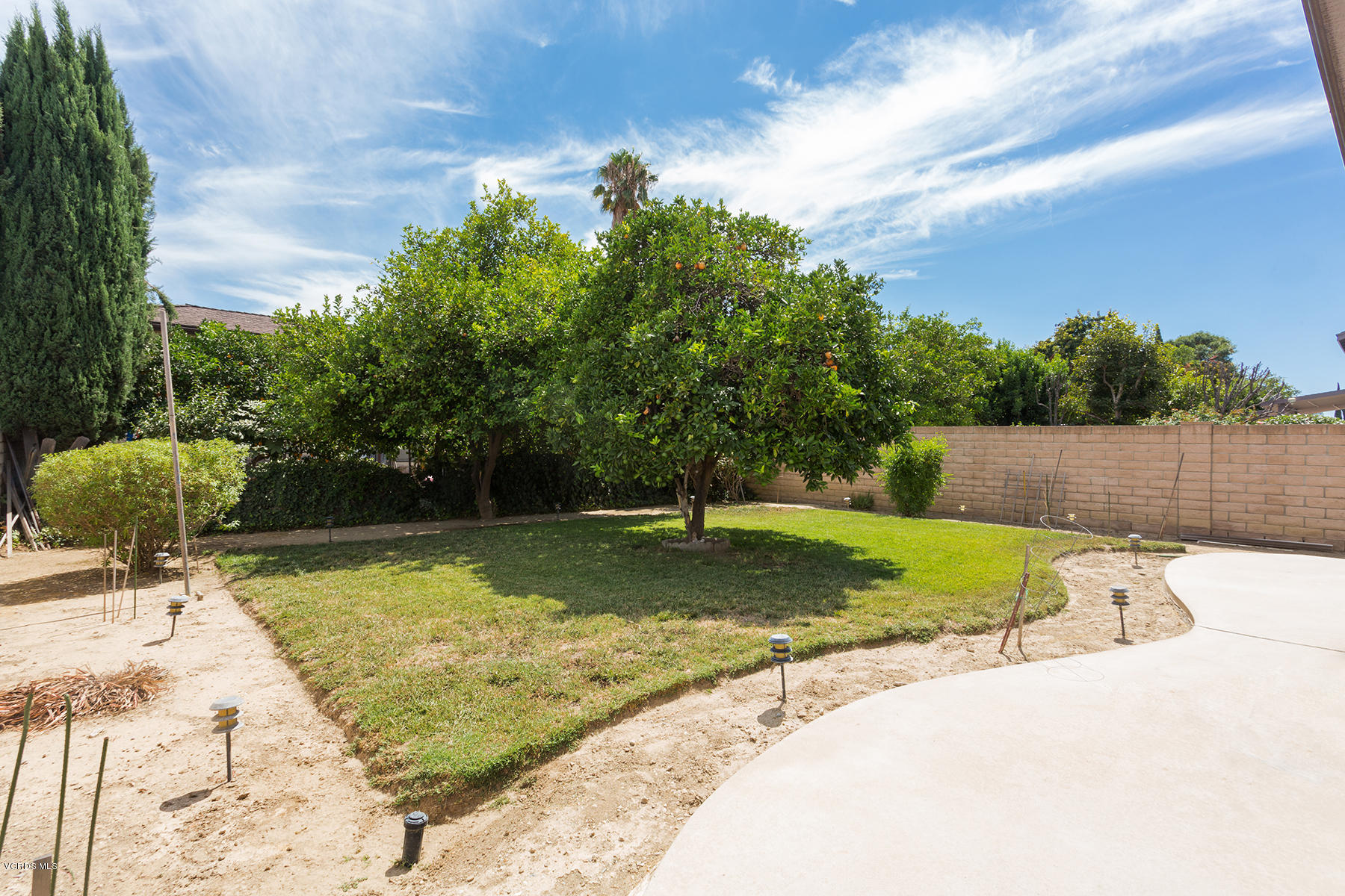 19700 Strathern Street Winnetka, CA 91306 - Photo 23 of 25 a view of a backyard with swimming pool