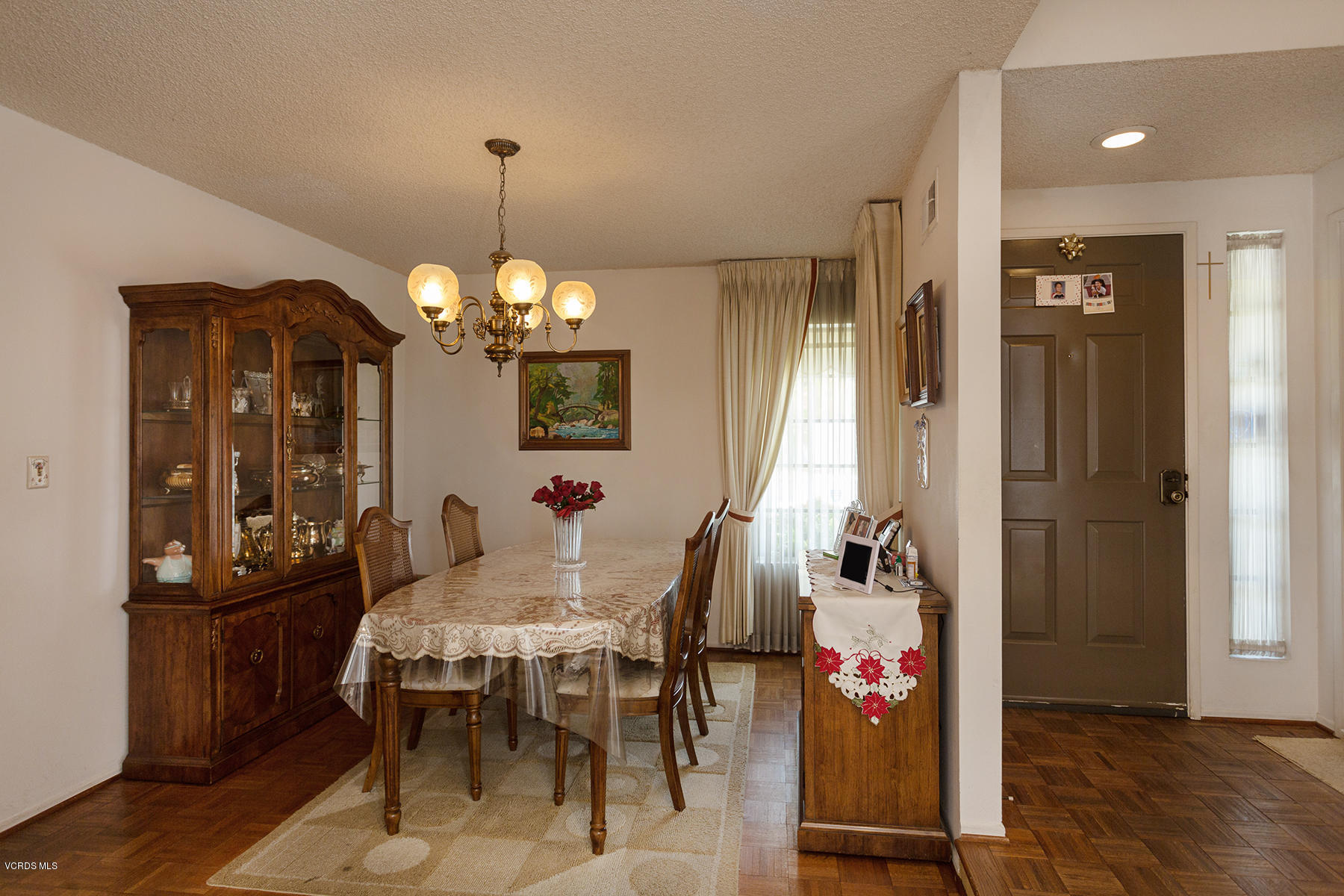 19700 Strathern Street Winnetka, CA 91306 - Photo 6 of 25 a view of a dining room with furniture and wooden floor