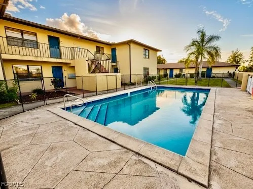 a view of a house with swimming pool