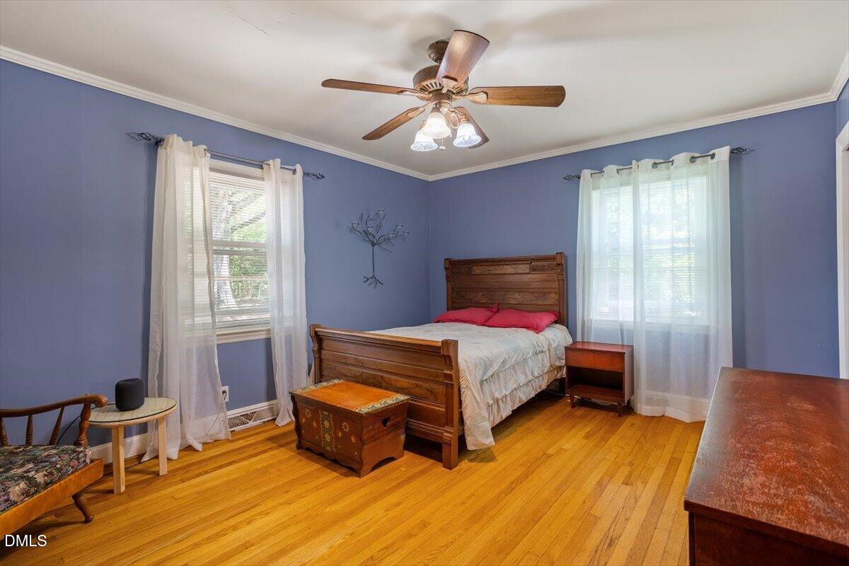3107 Dixon Road Durham, NC 27707 - Photo 26 of 35 a bedroom with a bed and window