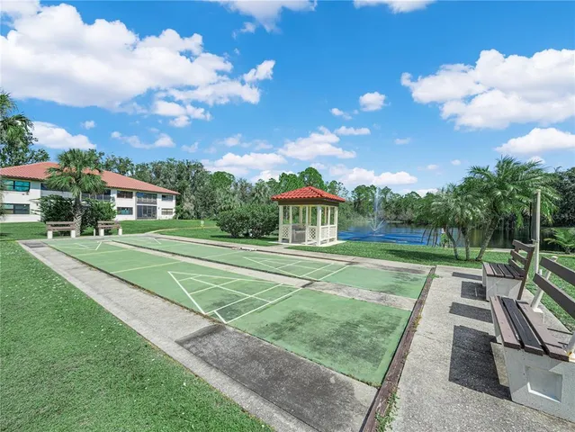 a view of a lake with a garden