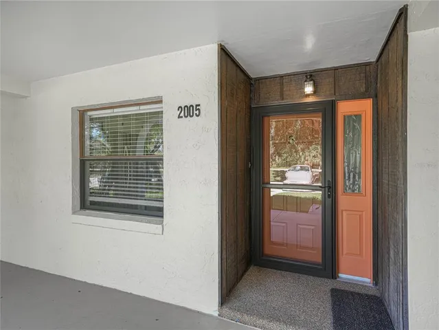 a view of hallway with windows