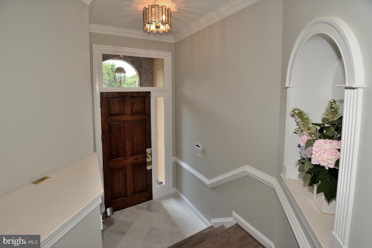 1548 Hampton Hill Circle McLean, VA 22101 - Photo 3 of 39 Elegant foyer entrance with marble floor.