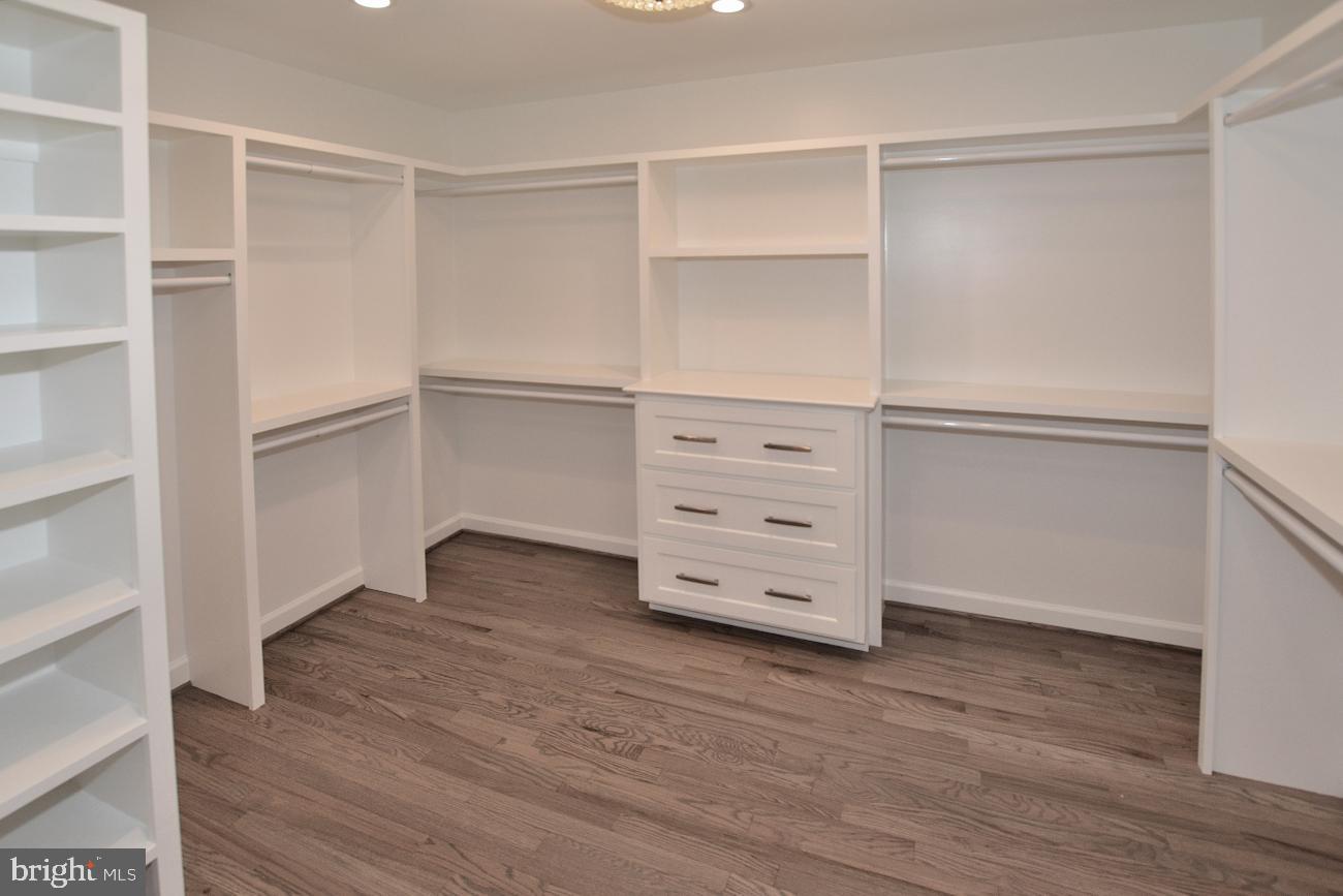 1548 Hampton Hill Circle McLean, VA 22101 - Photo 24 of 39 Walk-in closet with custom shelving & drawers.
