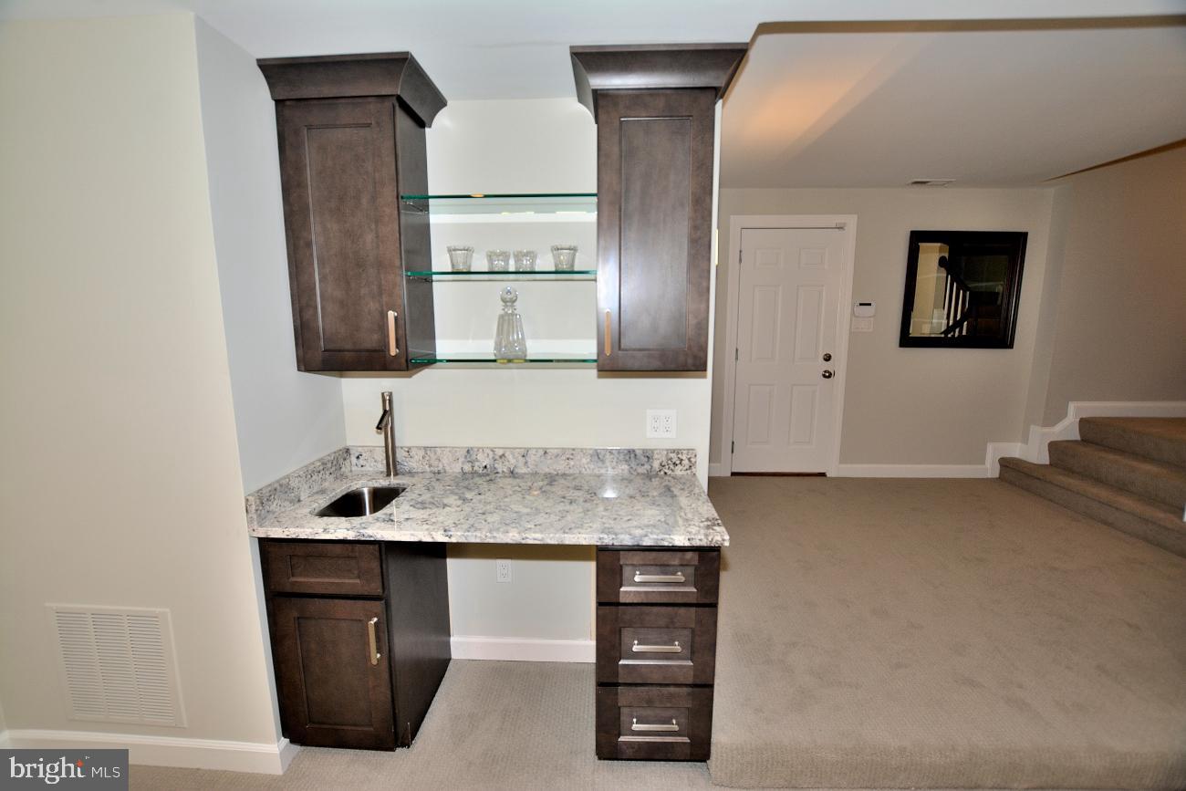 1548 Hampton Hill Circle McLean, VA 22101 - Photo 30 of 39 Wet bar with granite counter.