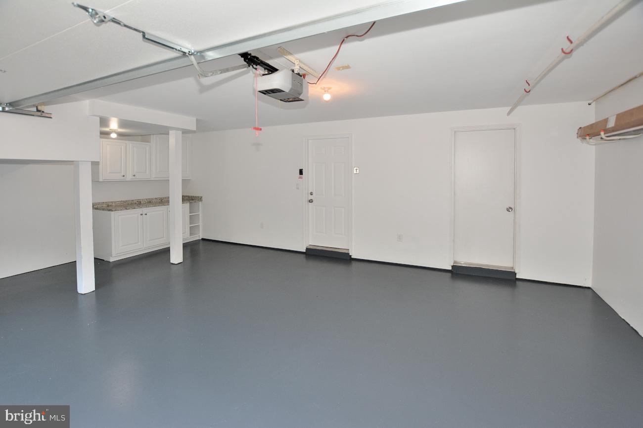 1548 Hampton Hill Circle McLean, VA 22101 - Photo 34 of 39 TWO car garage with utility room w/sink & shelves