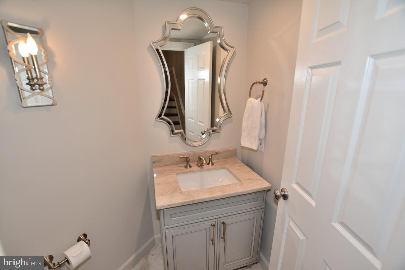 1548 Hampton Hill Circle McLean, VA 22101 - Photo 10 of 39 Powder Rm with marble floor, granite counter.