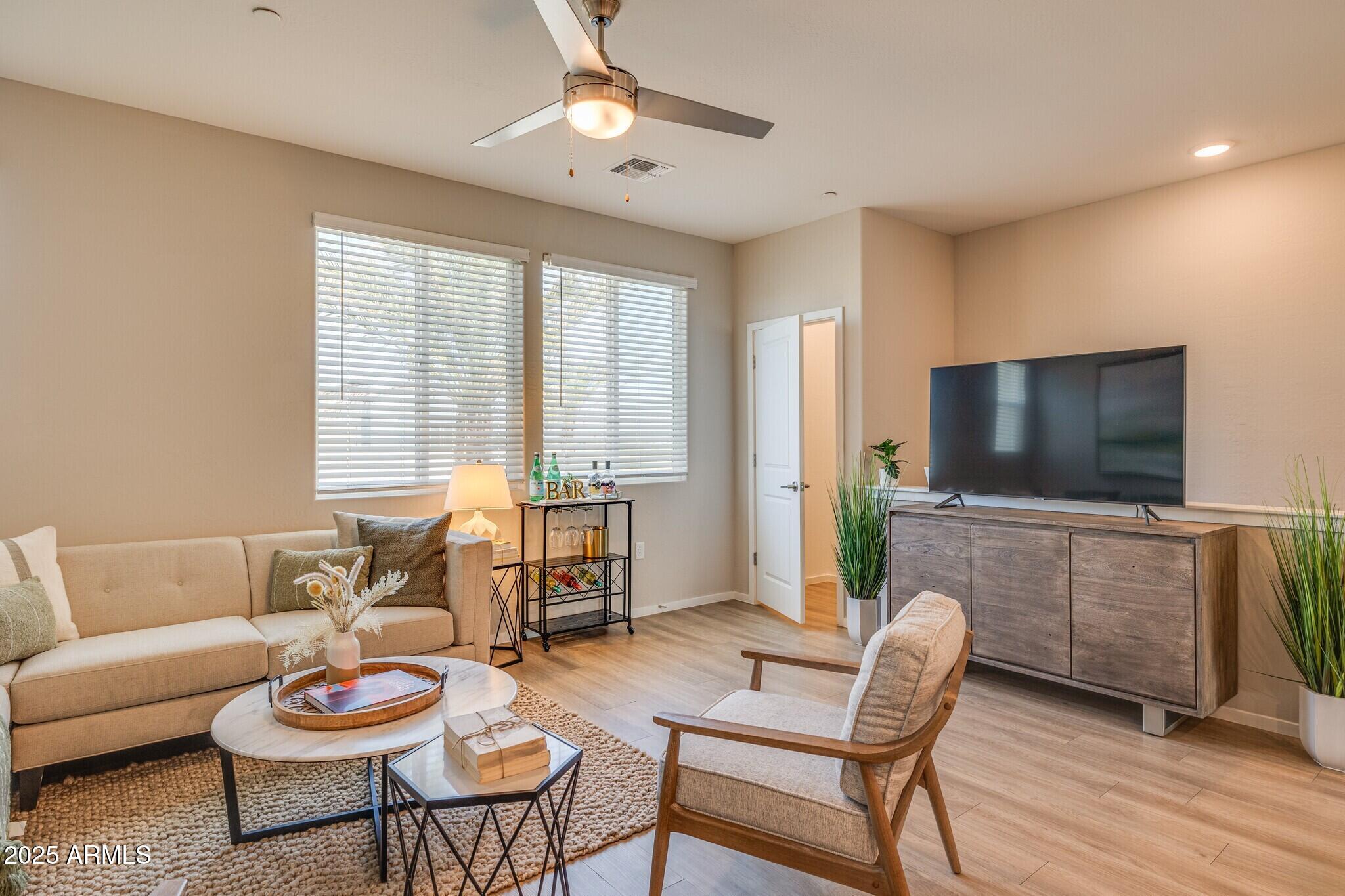 16830 North 141st Avenue, Unit 2A Surprise, AZ 85374 - Photo 4 of 28 Living Room 3