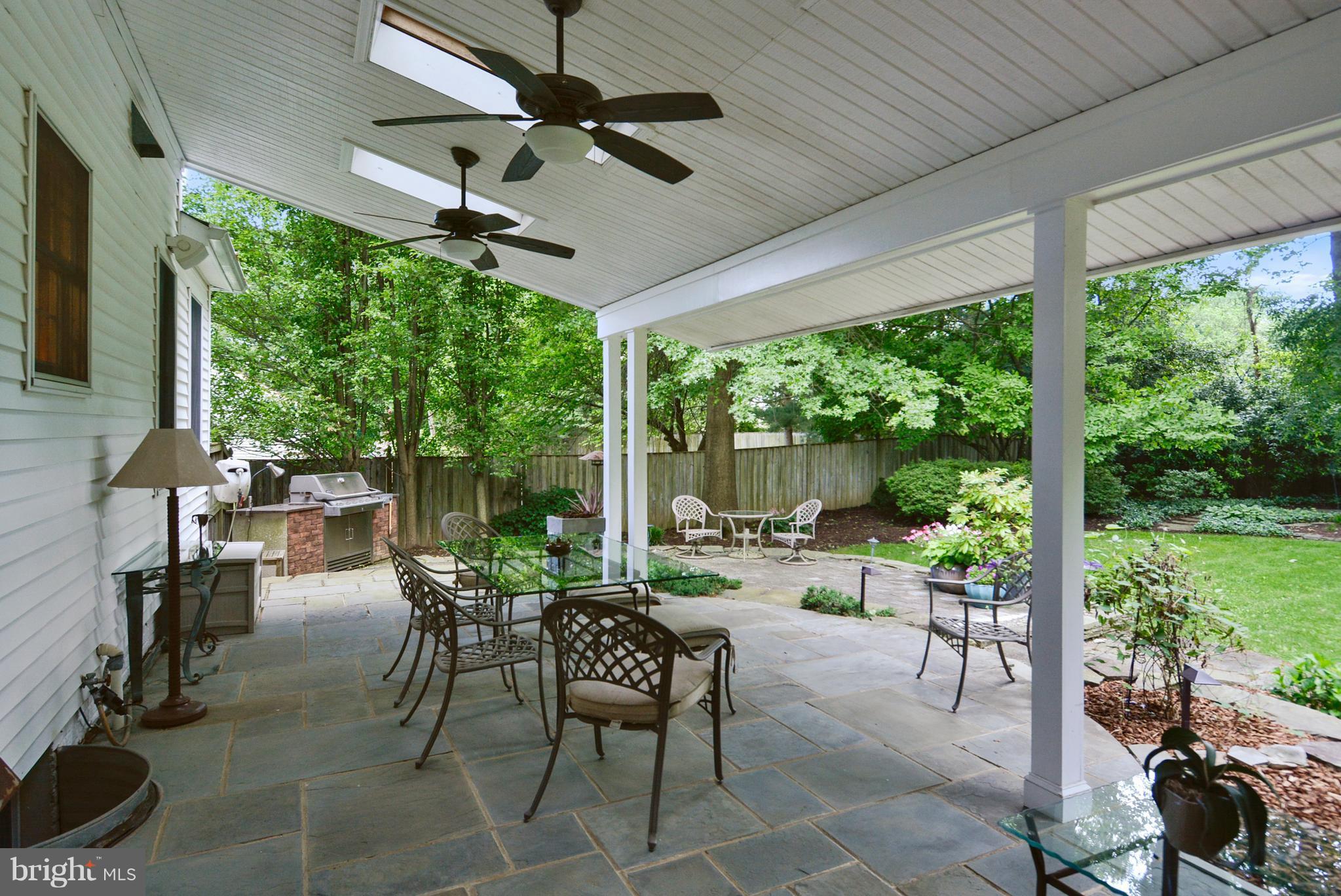 14628 Jaystone Drive Silver Spring, MD 20905 - Photo 28 of 30 Main patio area w/ skylight & fans