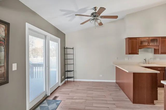 a view of a kitchen from the hallway
