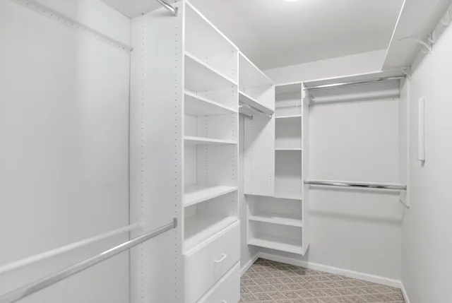 a view of an empty walk in closet