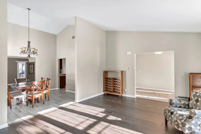 a view of a livingroom with furniture and wooden floor