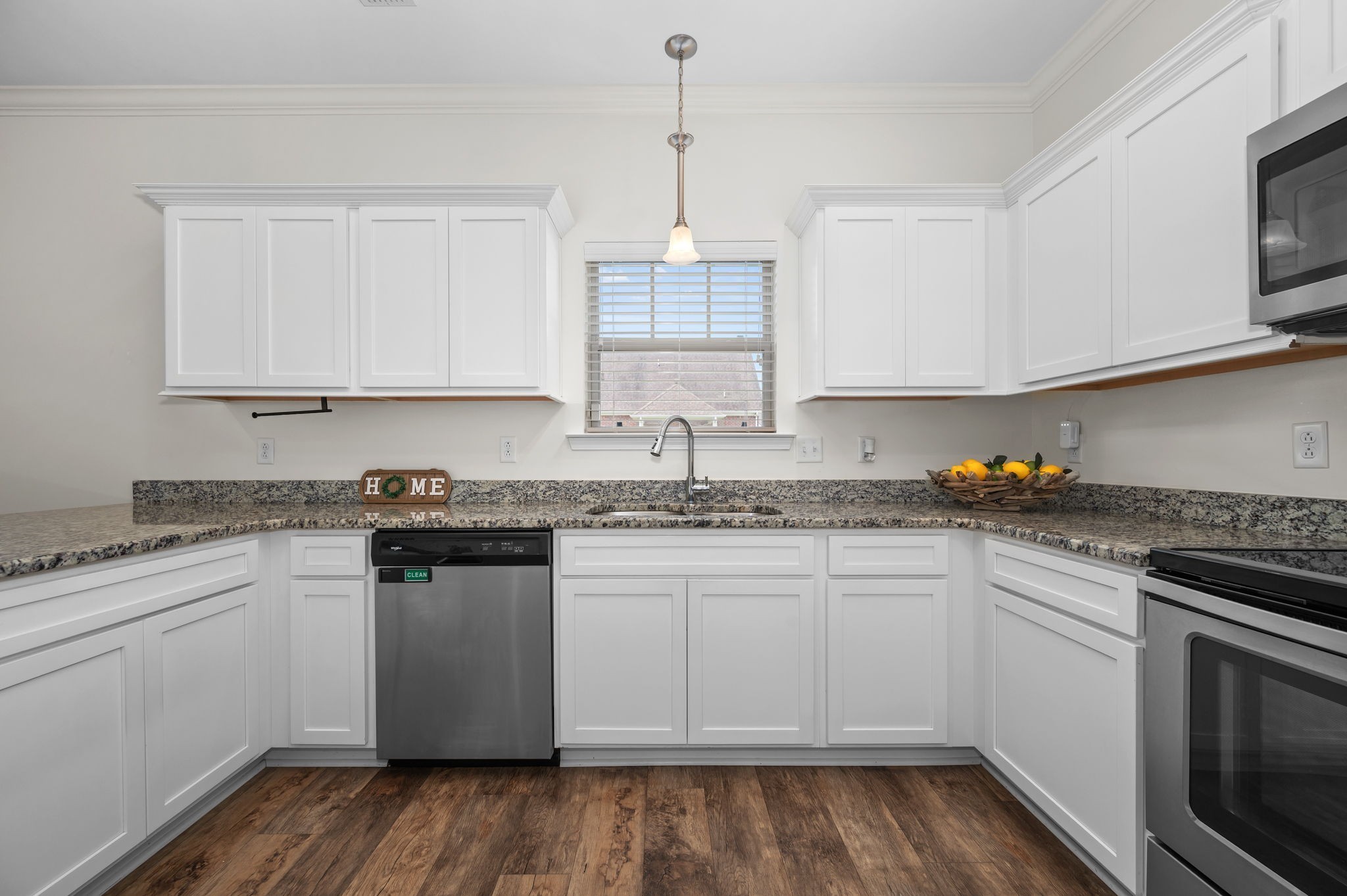 1113 Dunkirk Lane Murfreesboro, TN 37129 - Photo 14 of 31 a kitchen with granite countertop white cabinets and white appliances