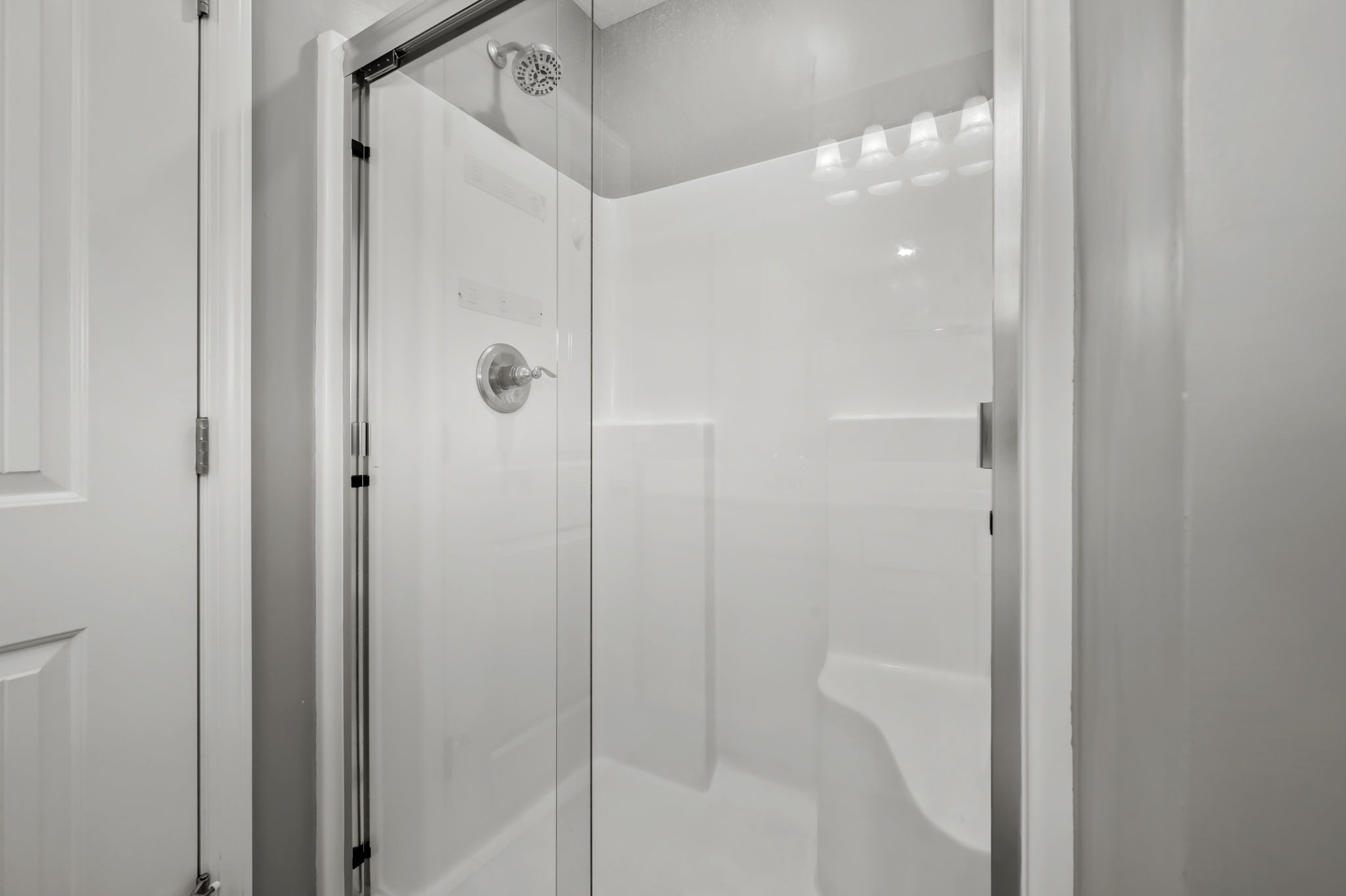 1113 Dunkirk Lane Murfreesboro, TN 37129 - Photo 20 of 31 a bathroom with a glass shower door