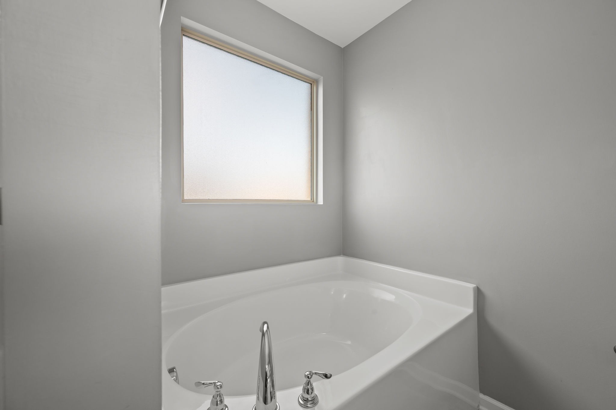 1113 Dunkirk Lane Murfreesboro, TN 37129 - Photo 22 of 31 a white bath tub sitting in a bathroom