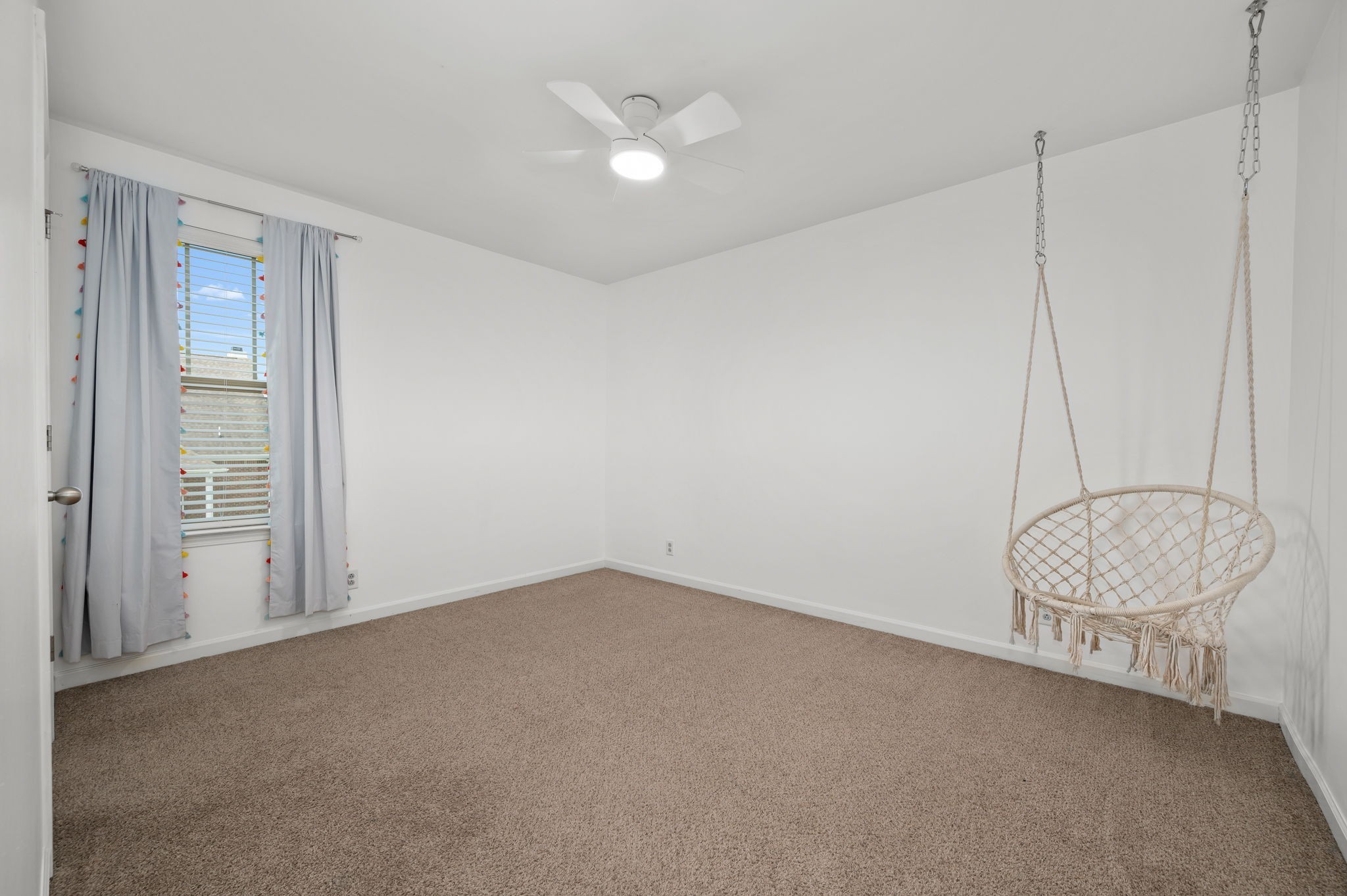 1113 Dunkirk Lane Murfreesboro, TN 37129 - Photo 25 of 31 an empty room with a ceiling fan and window