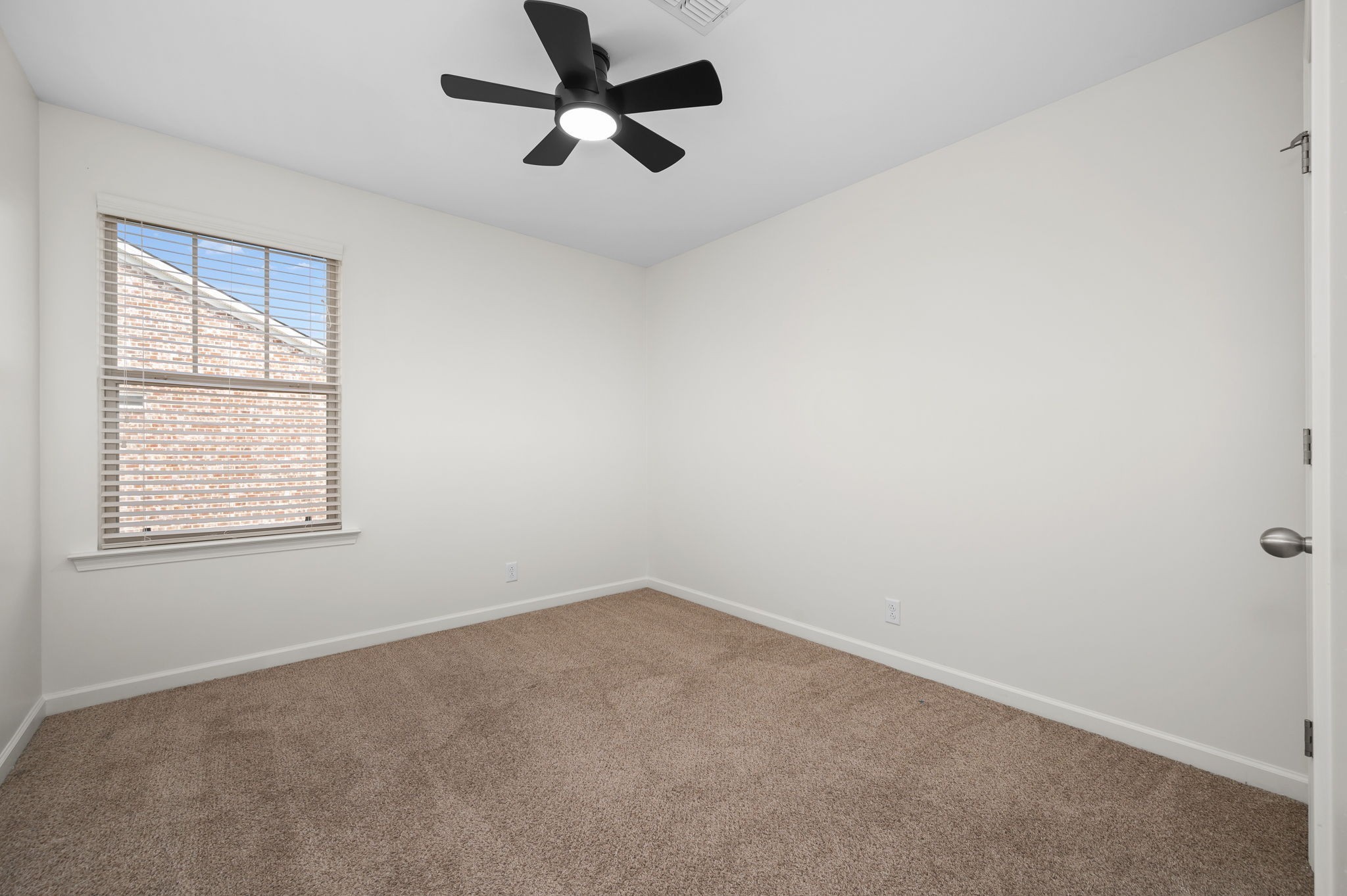 1113 Dunkirk Lane Murfreesboro, TN 37129 - Photo 26 of 31 an empty room with a window and a fan