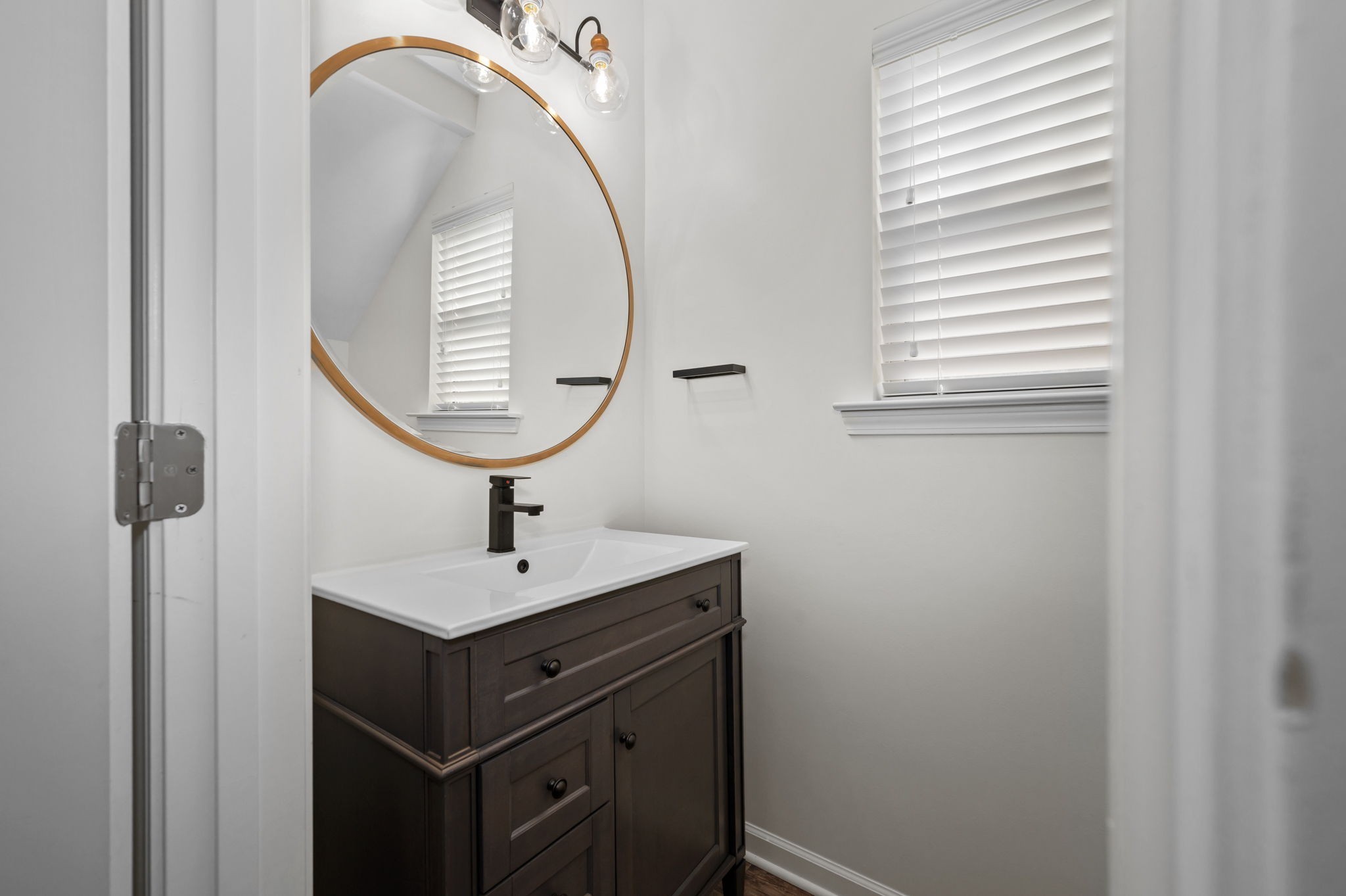 1113 Dunkirk Lane Murfreesboro, TN 37129 - Photo 7 of 31 a bathroom with a sink and a mirror