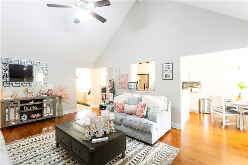 355 Conner Court Social Circle, GA 30025 - Photo 21 of 52 a living room with furniture and a flat screen tv