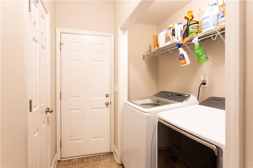 355 Conner Court Social Circle, GA 30025 - Photo 34 of 52 a utility room with dryer and washer